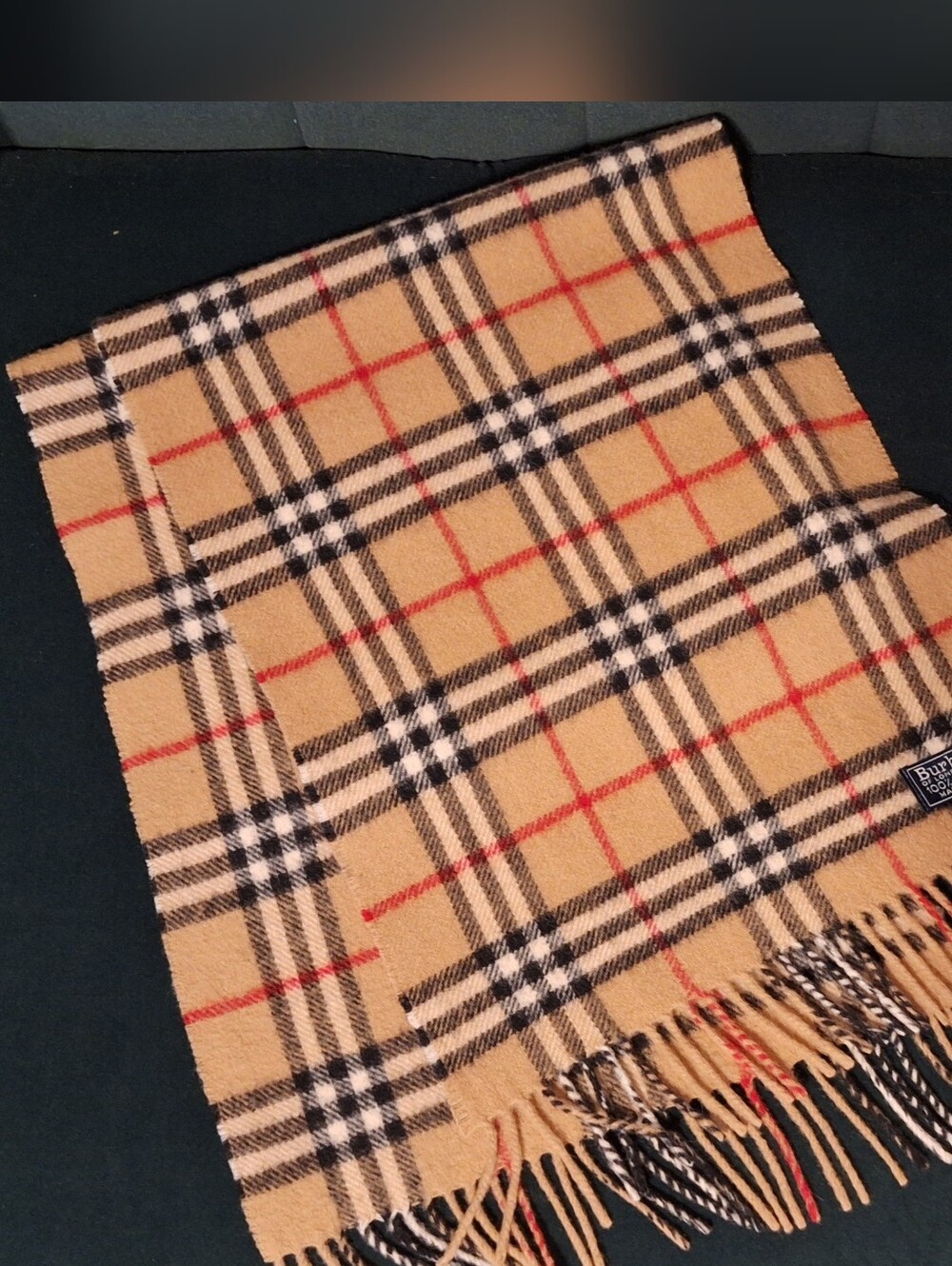 Burberrys 100% Lambswool Beige Plaid Scarf featuring the classic check pattern